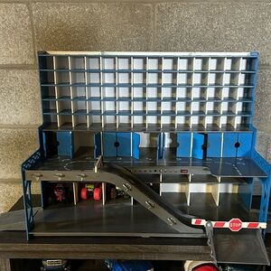 Blue and Silver Toy Parking Garage Playset